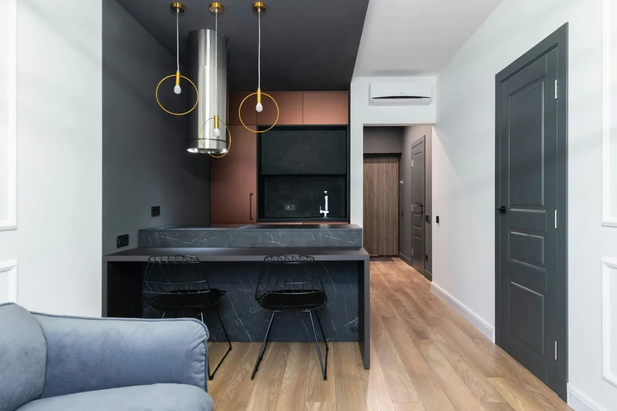 Vinyl flooring in modern kitchen and dining room, Botswana