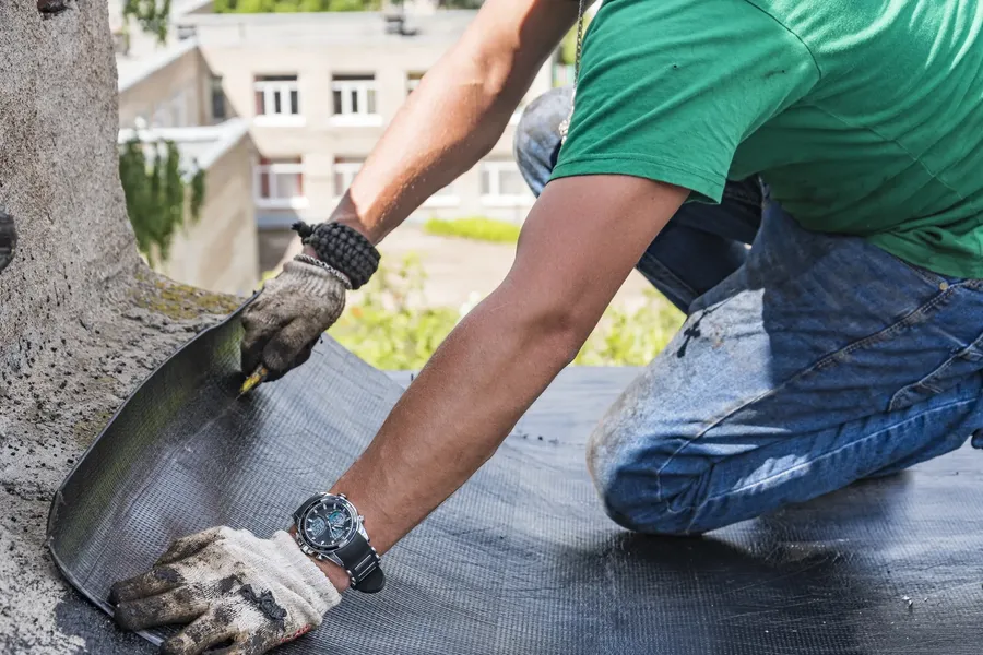 Waterproofing membrane application, rooftop, Botswana
